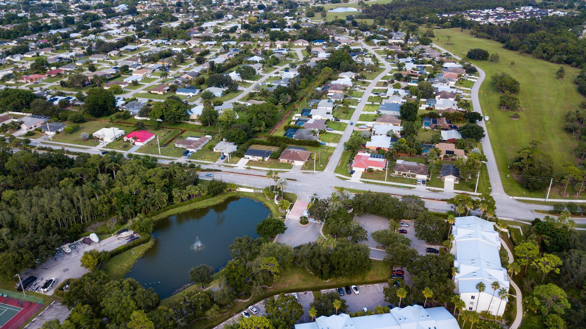 Angled aerial shot of property and surroundings