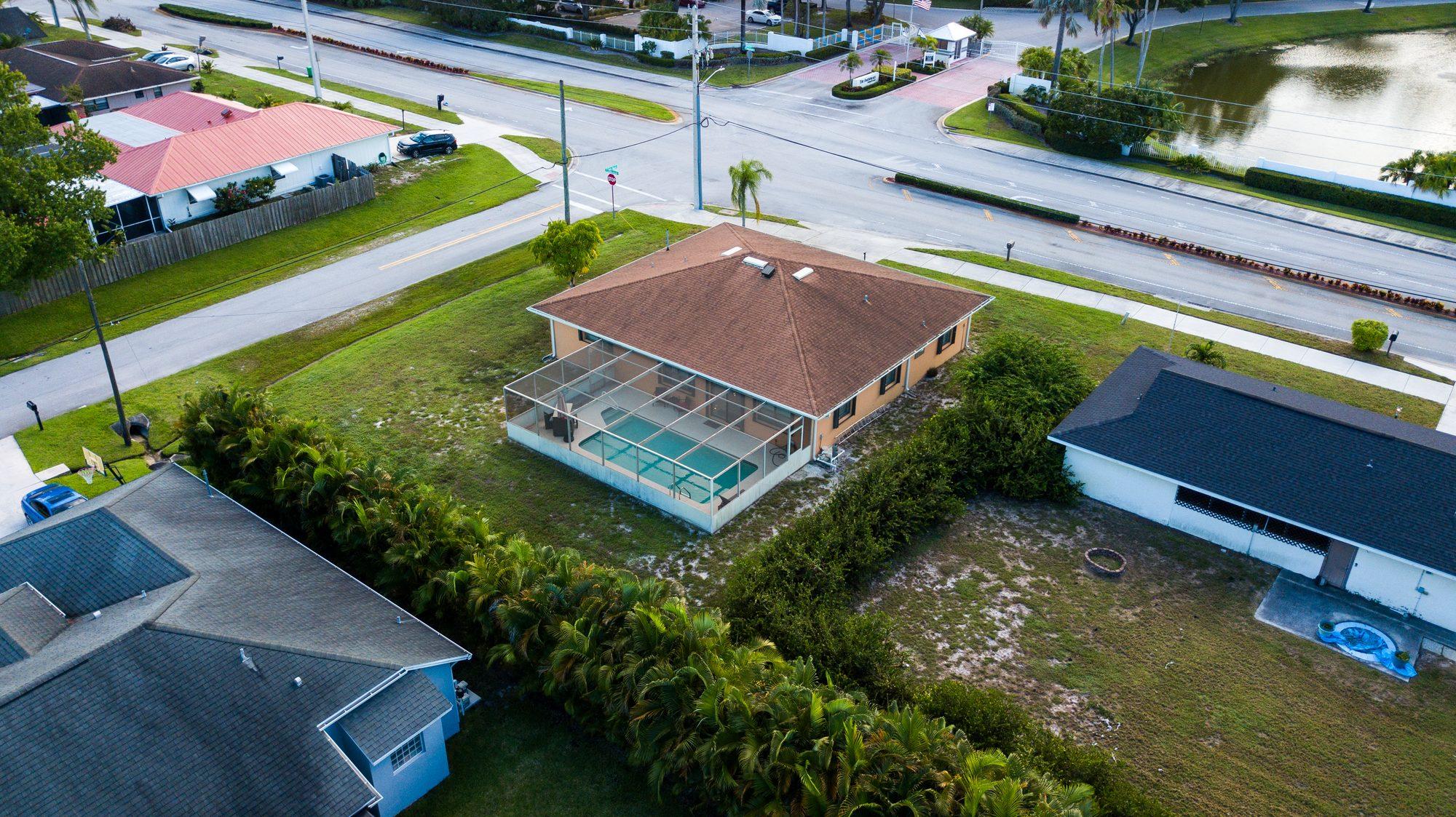 Aerial drone view of a neighborhood property