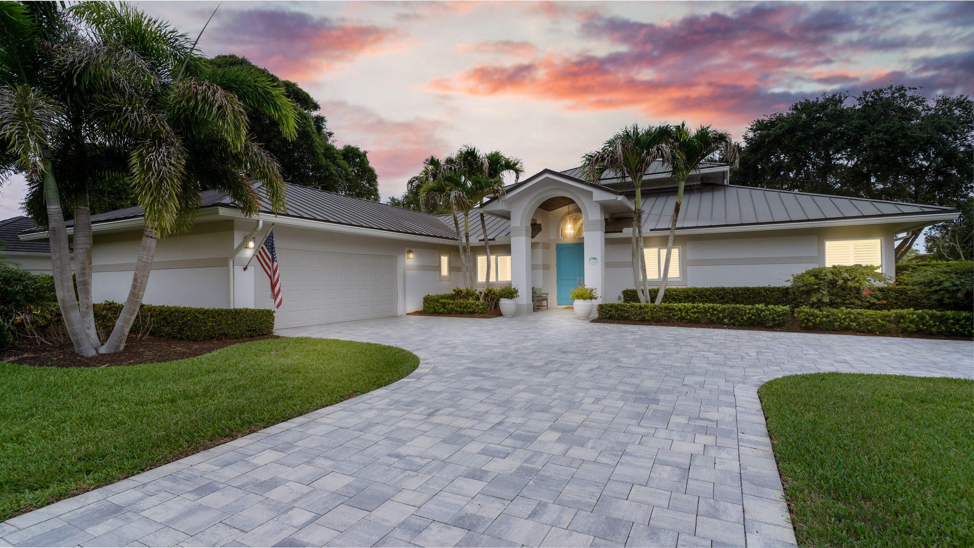 Luxury home exterior at twilight photographed by Quality Pixels