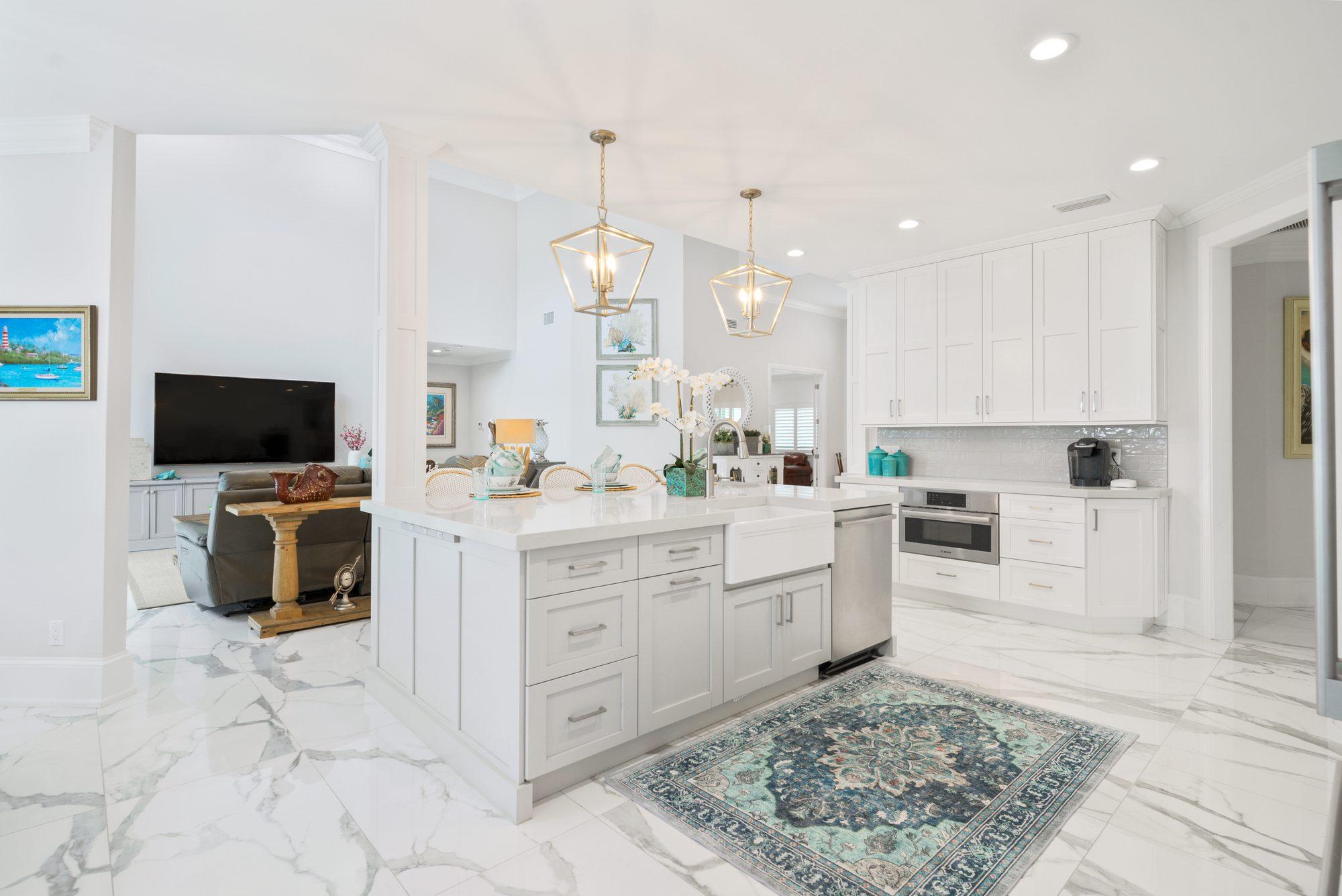 Open kitchen with pendant lighting and island